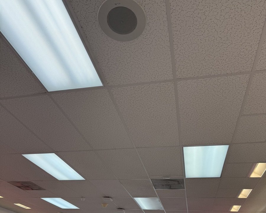 Repaired ceiling light fixtures in a retail store in Eldersburg, Carroll County, MD